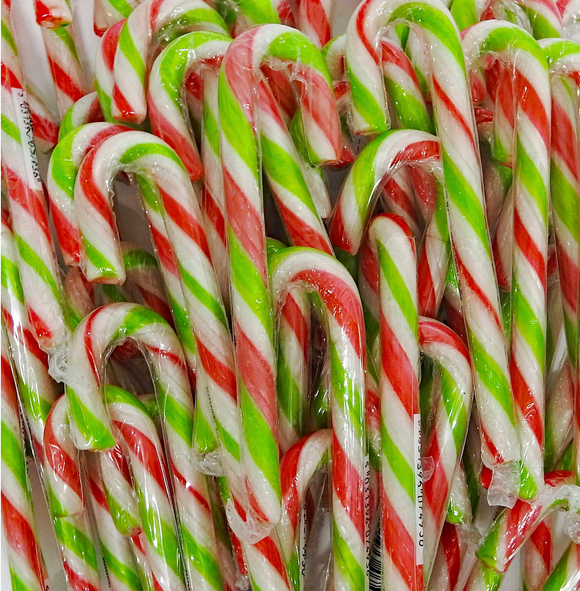 Stack of red, green, and white striped candy canes.