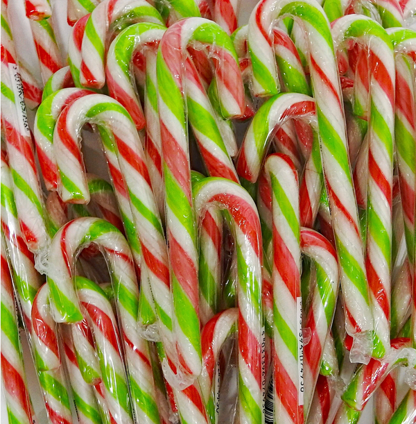 Stack of red, green, and white striped candy canes.