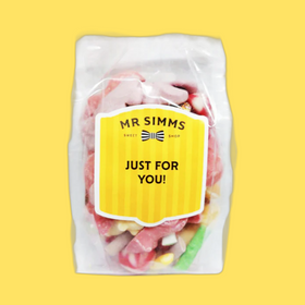 Packaged candy with a yellow label reading 'Mr Simms' on a yellow background